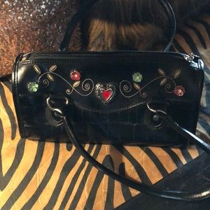 Like new black w/ jeweled embellishments purse